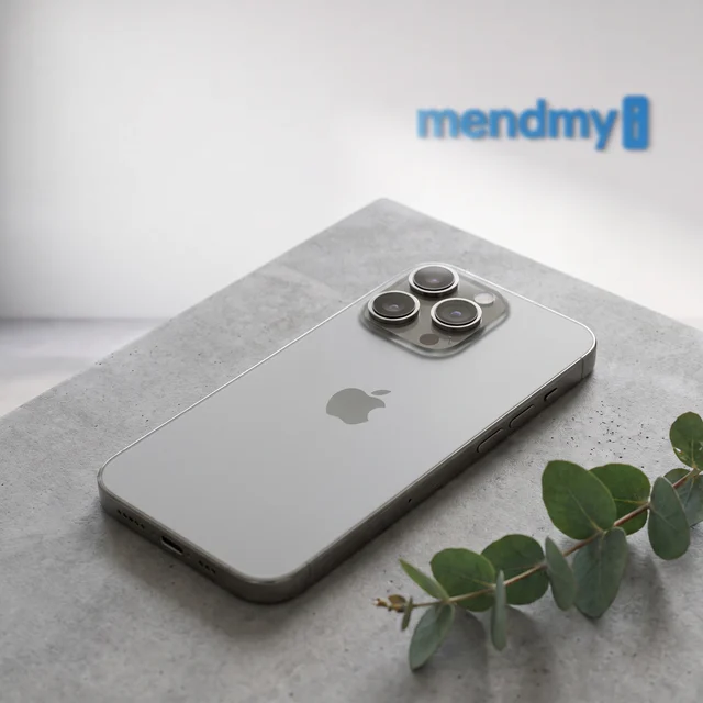 Apple iPhone 16 Pro 128GB Natural Titanium held in hand showing display