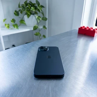 Apple iPhone 16 Plus Black in use, showcasing its 6.7-inch display – Certified Refurbished