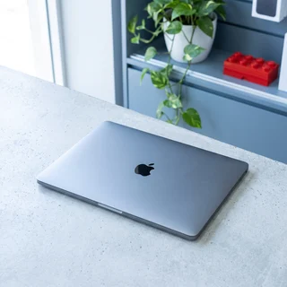 Apple MacBook Air M1 2020 Space Grey used in a coffee shop setting