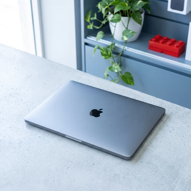 Apple MacBook Air M1 2020 Space Grey used in a coffee shop setting