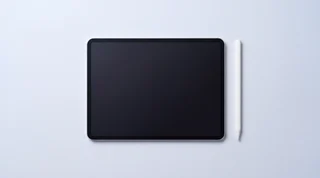 A single iPad Pro lying flat with an Apple Pencil drawing an unsteady wavy trail of blue light across its dark screen
