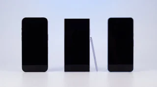 A freshly wiped iPhone with a blank screen and its ejected SIM tray, ready to sell